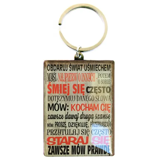 Brelok metalowy Kukartka - Obdaruj świat uśmiechem, myśl najpierw o innych, potem...